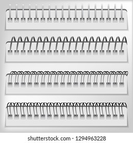 Set spiral binder.Spirals for paper sheets isolated on white. Book spine made out of plastic spring.