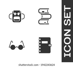 Establece el bloc de notas en espiral, la mochila escolar, anteojos y el icono Libro. Vector