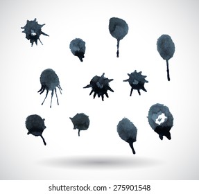 Set of splashes and blots black silhouettes on the white background. Vector illustration