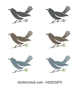 Set of of spring birds in branches with leaves .Vector illustration