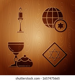 Set Star of David, Burning candle in candlestick, Jewish goblet and hanukkah sufganiyot and World Globe and Israel on wooden background. Vector