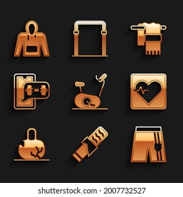 Set Stationary bicycle, Protein sport bar, Short pants, Heart rate, Broken weight, Fitness app, Towel hanger and Hoodie icon. Vector