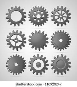Set of steel differently shaped cogwheels