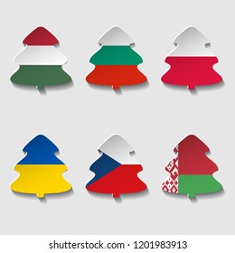 Set sticker in the form of a Christmas tree with flags of the countries celebrating Christmas. Vector greeting illustration with cut paper.
