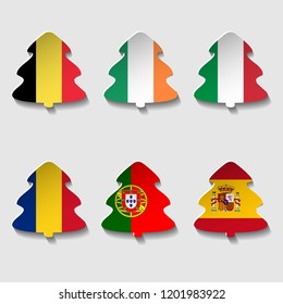 Set sticker in the form of a Christmas tree with flags of the countries celebrating Christmas. Vector greeting illustration with cut paper.