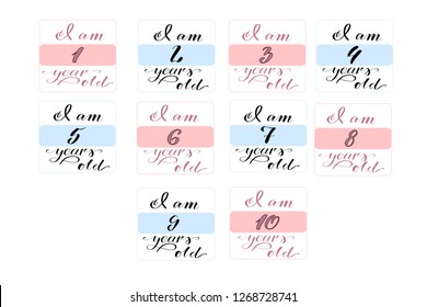 Set of stickers for baby clothing. "I am 1 year old" to "I am 10 years old" cards for photo session. For boys and girls. Cards for kids photo session. Pink and blue blocks with text. 