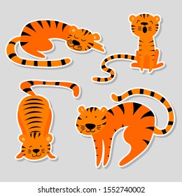 Set of stickers with cute cartoon tigers in different poses. Flat vector illustration.