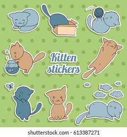 set of stickers with cute kittens on green background