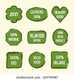 Set of stickers for design labels. Text ECO, Gluten Free 100%, Healthy Food, Natural, Vegan, Farm Fresh Product, BIO, Organic. Background painted brush. Isolated.