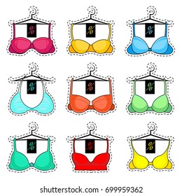 Set of stickers different bras on a hanger. Icons sale.