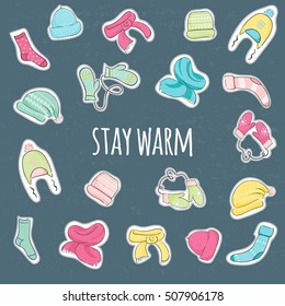 Set of stickers with Knitted accessories and inscription "Stay Warm". Hats, scarves, mittens, socks. Warm clothes background.