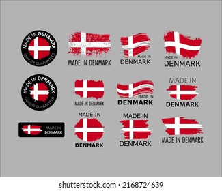 Set of stickers. Made in Denmark. Brush strokes shaped with Danish flag. Factory, manufacturing and production country concept. Design element for label and packaging. Vector 