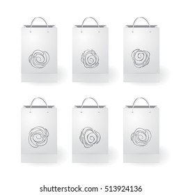 set of stock vector isolated paper shopping bag on the white background. floral design