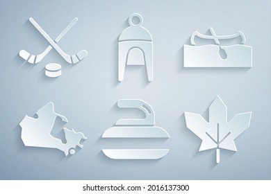 Set Stone for curling, Kayak canoe, Canada map, Canadian maple leaf, Winter hat and Ice hockey sticks and puck icon. Vector