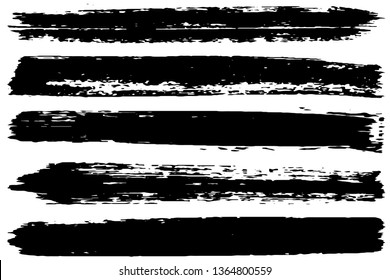 Set of strokes of black paint with a dry brush. Vector brush in grunge style