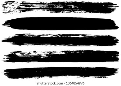 Set of strokes of black paint with a dry brush. Vector brush in grunge style