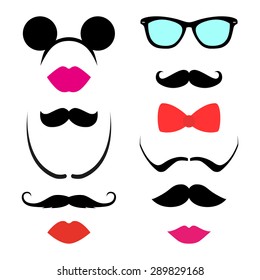 Set of stylish silhouettes hipster elements consisting of different mustaches, lips, a bow, mouse ears and glasses