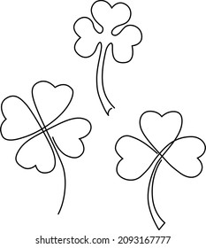 Set of stylized clover leaves. Shamrock. Continuous line drawing. Vector illustration.