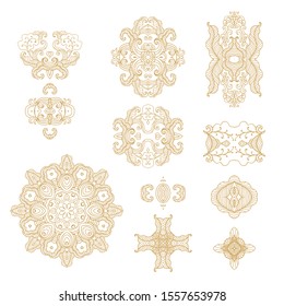 Set of stylized golden ornamental rosettes, decorative lements, vignettes  on white  background