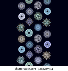Set of stylized ornamental rosettes- snowflakes on dark background