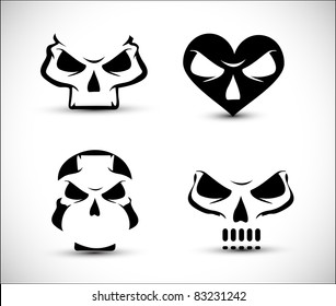 set of stylized skull shaped design elements on white background.