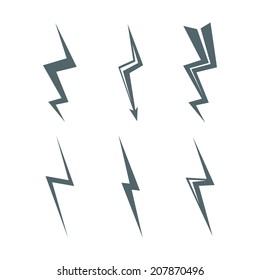 Set of stylized symbol lightning. Dark silhouette on a light background 