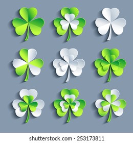 Set of stylized trendy white and green 3d Patricks leaf clover isolated on grey background. Beautiful elements of design for St. Patrick's day. Stylish creative modern icons. Vector illustration 