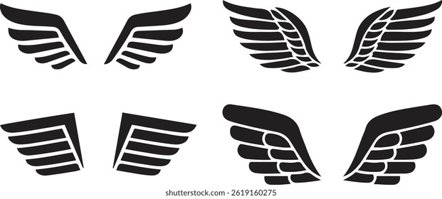 Set of stylized wing silhouettes for logo, tattoo, and heraldic designs