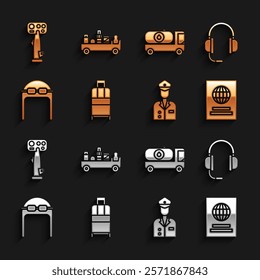 Set Suitcase, Headphones with microphone, Passport, Pilot, Aviator hat goggles, Fuel tanker truck, Aircraft steering helm and Airport luggage towing icon. Vector