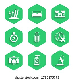 Set Suitcase, Sunscreen spray bottle, Surfboard, Clock with airplane, Photo camera, Compass, Sand castle and Ski sticks icon. Vector