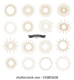 Set of sunburst design elements gold color. Vintage style elements for graphic and website design. Vector light rays elements