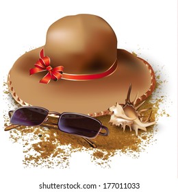 Set of sunglasses, a hat and a seashell, isolated on sand background 
