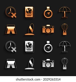 Set Surfboard, Sun protective umbrella, Hot air balloon, Photo camera, Short or pants, Compass, Clock with airplane and Passport icon. Vector