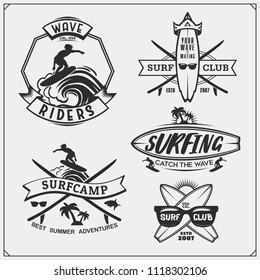 Set of surfing emblems, labels and badges. Surf design elements.