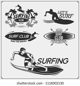 Set of surfing emblems, labels and badges. Surf design elements.