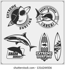 Set of surfing emblems with shark. Surf design elements. Print design for t-shirts.