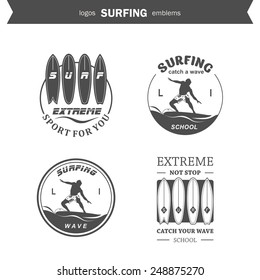 Set of surfing logos, emblems and design elements