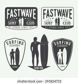 Set of surfing logos, labels, badges and elements in vintage style. Vector illustration