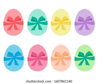A set of sweet pastel eggs isolated on white background. Concept of Easter Day. They’re very cute with satin ribbon bow on each. 