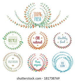Set of symmetrical floral graphic design elements. Ecology labels.