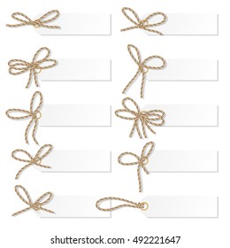 Set of tag labels with rope bakers twine bows on white background