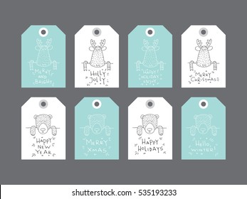 Set tag with lettering, wishes, holiday Christmas or New Year. Christmas, lettering written underneath drawn cartoon animals