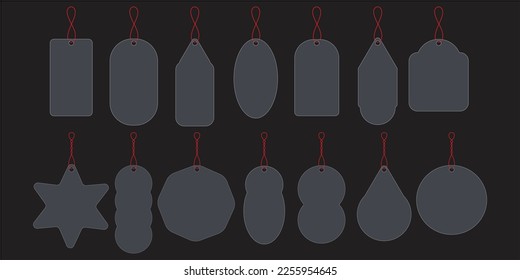 set of tags, labels, stickers on multiple sizes. dark grey tag.