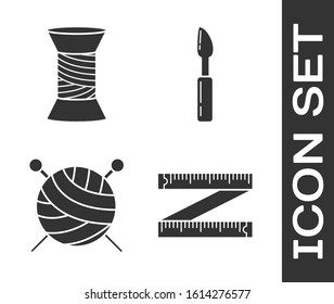 Set Tape measure, Sewing thread on spool, Yarn ball with knitting needles and Cutter tool icon. Vector
