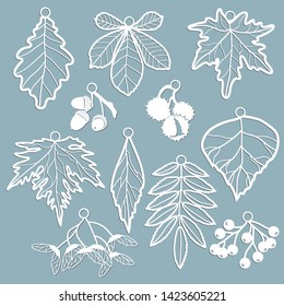 Set template for laser cutting and Plotter. Leaves Oak, maple, Rowan, chestnut, berries, acorn, seeds, birch, ash in the form of pendants. Leaves for decoration. Vector illustration. Sticker set. Plot