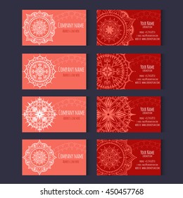 Set of templates for business cards with floral ornaments in red colors. Corporate style vector.