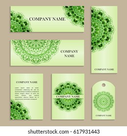 Set of templates for business cards.Colored vector illustration for corporate identity, individual cards, form style. Leaflets for advertising or company descriptions. Front page with green pattern.