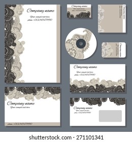 Set of templates for cd disks, envelopes, notebooks, credit card, business card and invitation card with floral ornament. Corporate style vector.