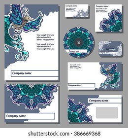 Set of templates for cd disks, envelopes, notebooks, credit card, business card and invitation card with floral ornament and colibri bird. Corporate style vector.