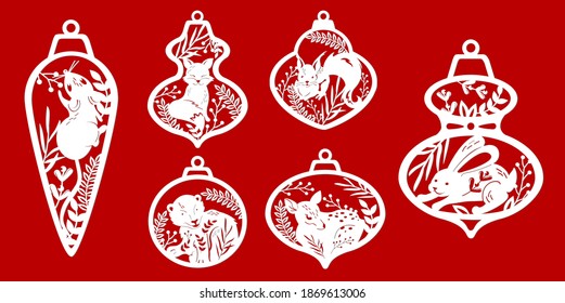 a set of templates for laser cutting of Christmas tree toys of different shapes. Christmas decoration for the window. Paper cut vector illustration with forest animals in the leaves.